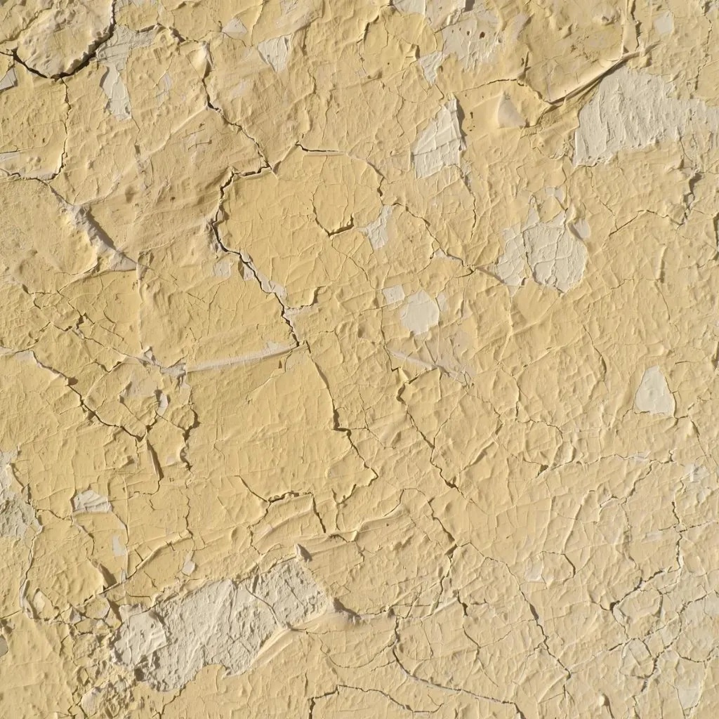 Peeling paint on an older home surface indicating potential lead paint concern in Baton Rouge